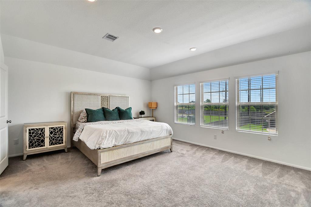 Upstairs is the primary bedroom