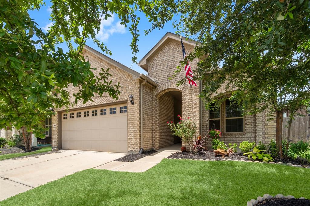 24502 Royal Pike Drive Katy, Texas Beautifully appointed residence in the coveted King Crossing community. With abundant natural light, its open floor plan invites modern, comfortable living. The gourmet kitchen boasts espresso cabinetry, stainless appliances, quartz countertops, and a sleek subway tile backsplash. An expansive island overlooks both family and dining areas—ideal for casual meals. Retreat to the primary suite, where a private sanctuary awaits with an en-suite bathroom offering dual sinks, a separate soaking tub and shower, and a generous walk-in closet. The thoughtfully positioned secondary bedrooms at the front of the home ensure enhanced privacy for family members or guests. Step outside to discover two delightful outdoor spaces. A charming bricked front porch greets you upon arrival, while a serene backyard oasis awaits with a covered patio accented by a retractable awning—ideal for hosting gatherings or enjoying quiet relaxation in a low-maintenance setting with the privacy of no rear neighbors.