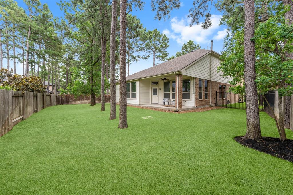This property offers a fantastic backyard with a covered porch – ideal for morning coffee, al fresco dining, or simply enjoying the peaceful surroundings.