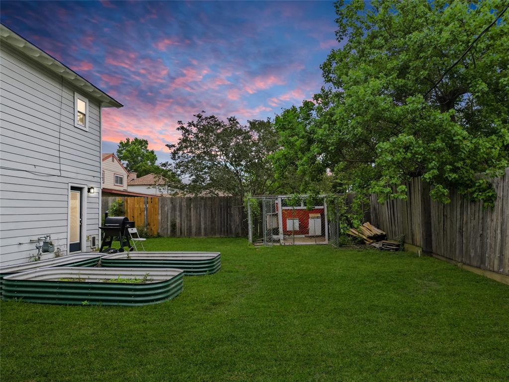 Enjoy your spacious outdoor area with endless possibilities—perfect for gardening, outdoor projects, or simply relaxing. The fenced yard offers privacy, while the open lawn provides ample space for kids, pets, or future improvements. Whether you envision weekend barbecues or a custom outdoor retreat, this yard is a versatile canvas for your ideas. Nestled in the left back corner of the backyard is a chicken coop!