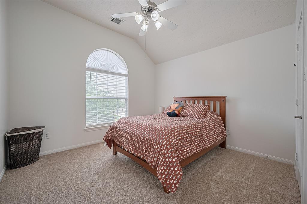 Bright and comfortable, this bedroom features a spacious closet and window that fills the room with natural light. Whether used as a guest room, children’s room, or personal retreat, it offers the perfect balance of functionality and warmth.
