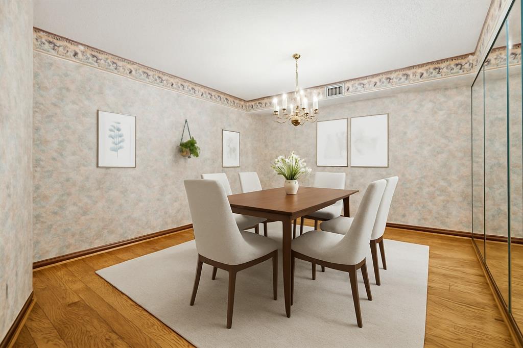 Formal dining as staged virtually with a dining table.12190 Willowridge Cir