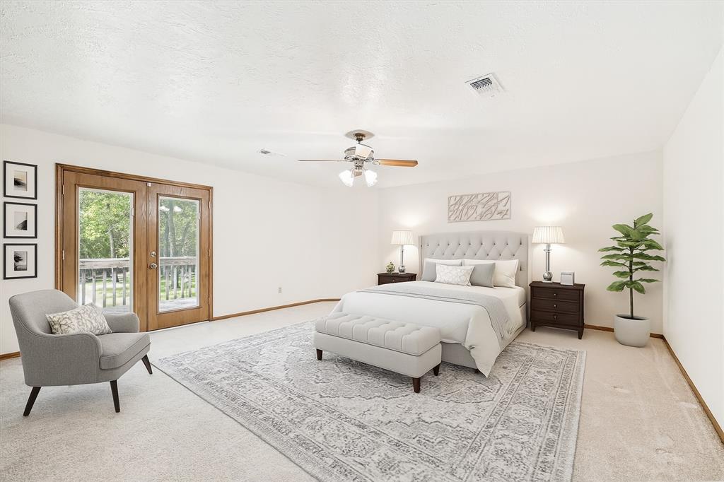 Super cute room furnished with the double doors out to the terrace overlooking the Naturous yard! Watch the bluejays and the redbirds at the bird feeder or the deer and ducks that stop by. 12190 Willowridge Cir