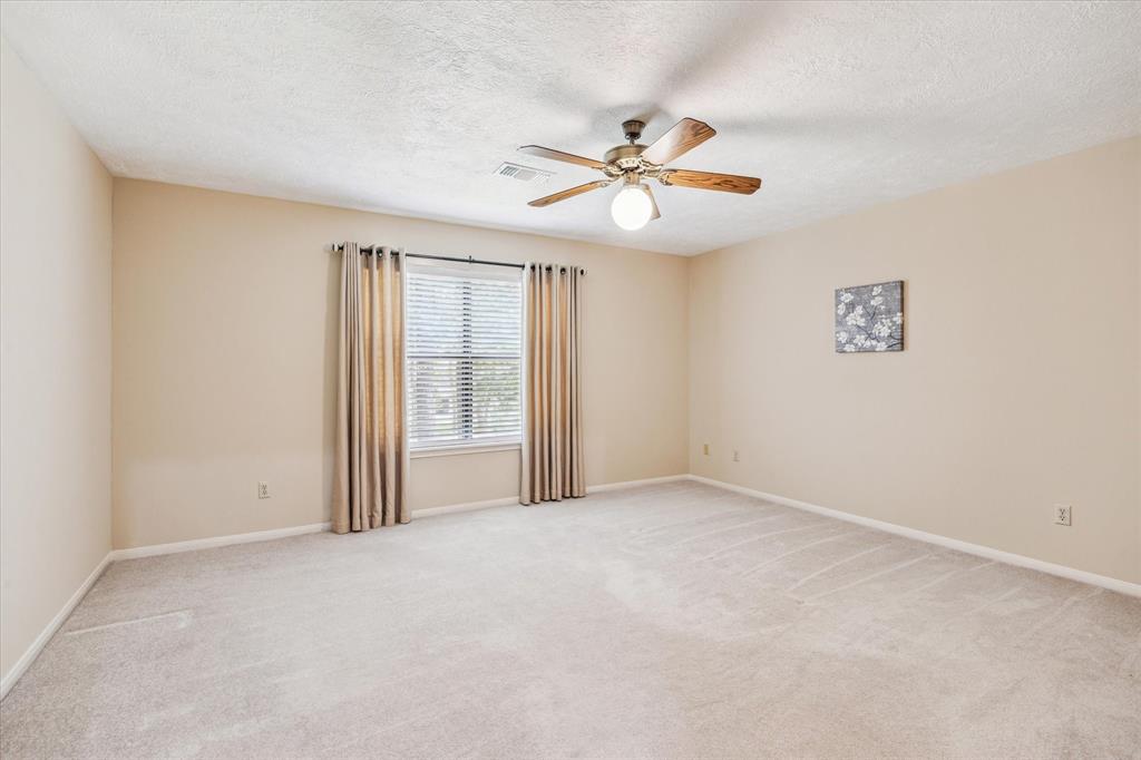 Bedroom two, spacious with walk in closet and plenty of lighting and jack and jill bath.12190 Willowridge Cir