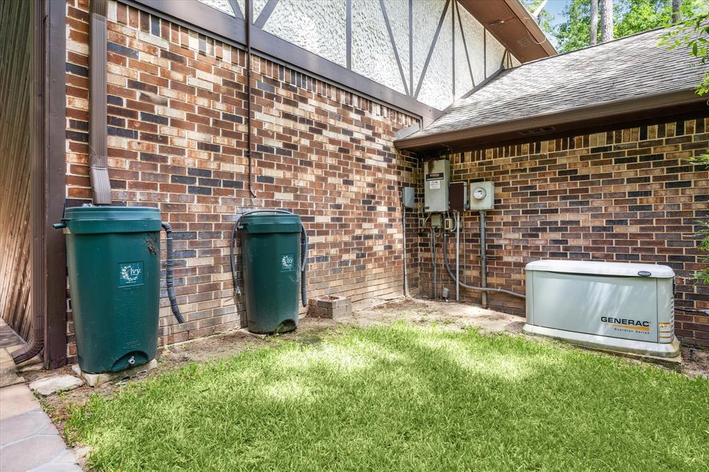 Never lose power with the gas powered generac! Also cool, there are three rain barrels to water the grass, Fun fact, the home uses city water but the yard uses the well water. They thought of Everything! Keep your yard green all year without the expense. 12190 Willowridge Cir