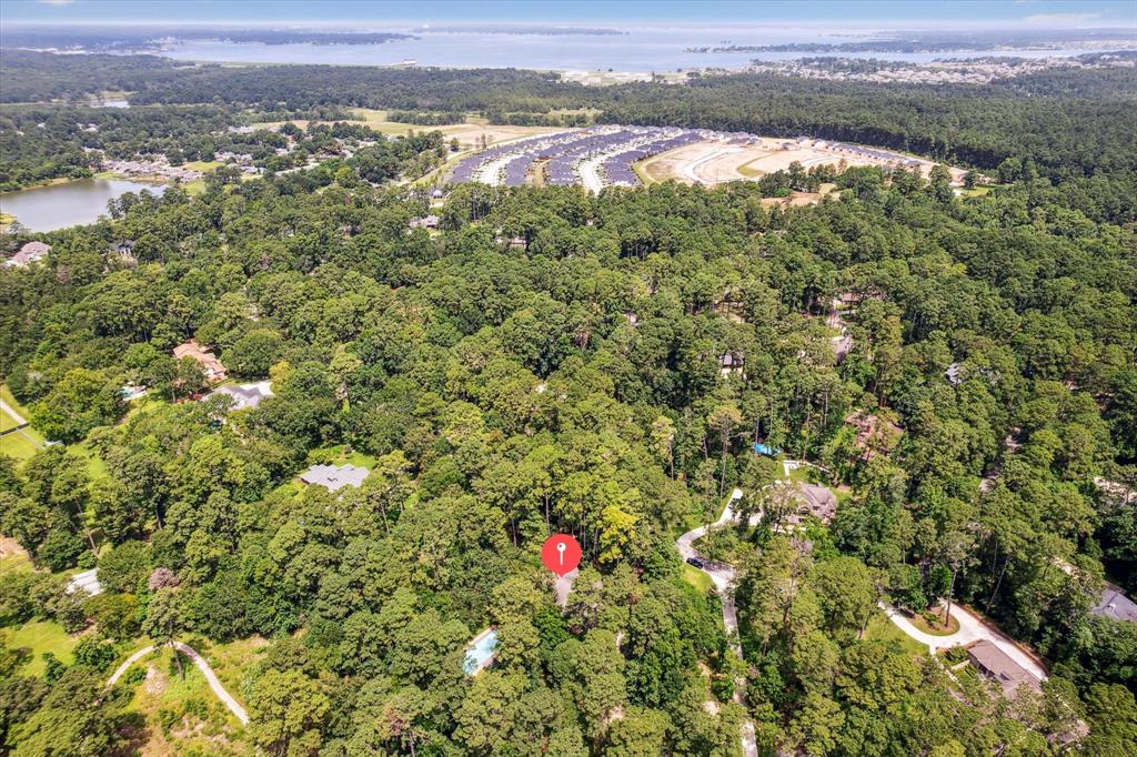 The red dot is the home and in the distance you can see the Gorgeous Lake! Far enough not to flood and close enough for all fun!12190 Willowridge Cir
