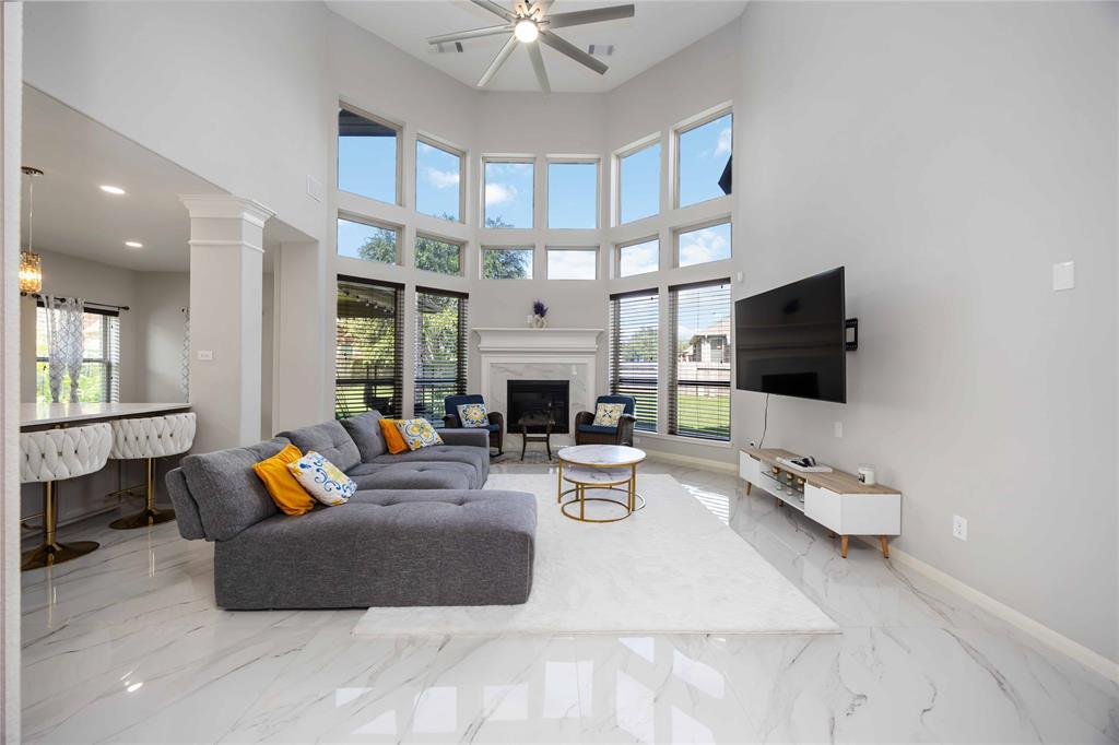 Gas log fireplace. Upgraded large ceiling fan.