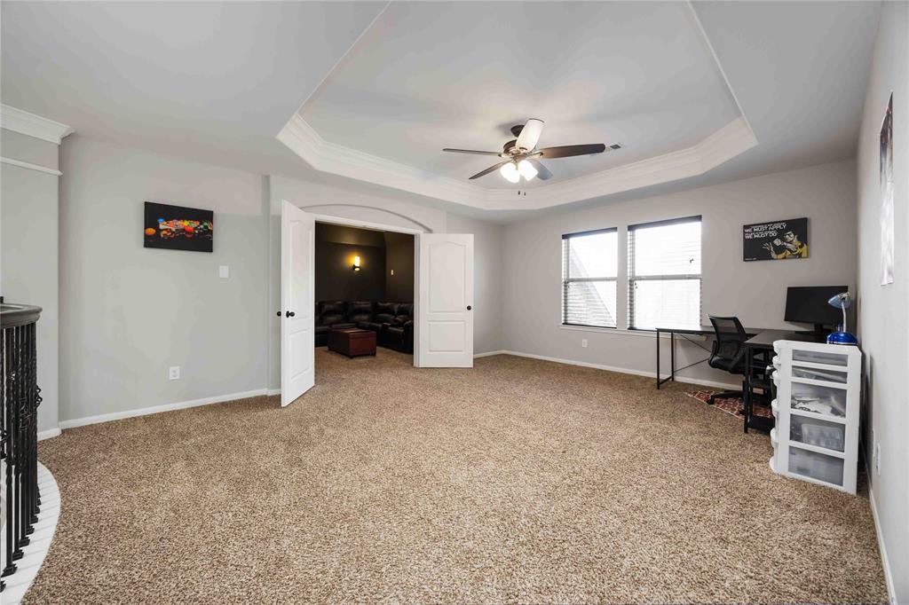 Large Game room with trey ceilings.