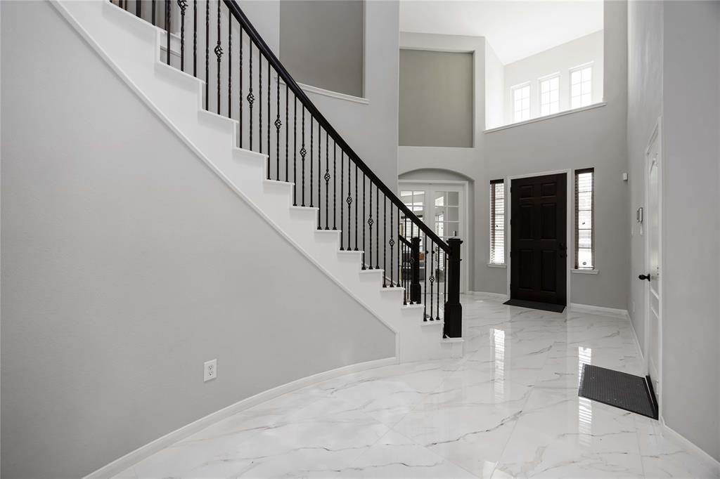 8-foot front door with decorative niches