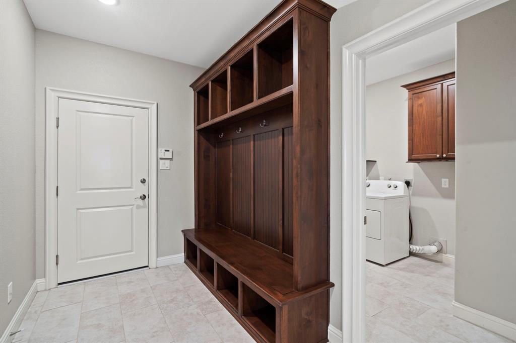 The mud room provides a place to stash backpacks and jackets keeping everything neat and tidy.