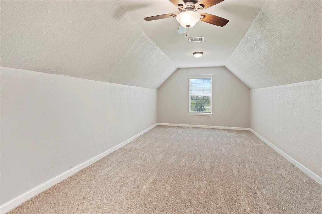 Expansive upstairs bonus room was used as game/media room. Movie viewings and family game nights will be enjoyed in this great space.