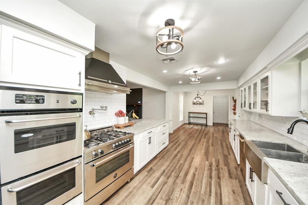 Spacious and inviting—this view from the kitchen flows into a sunny breakfast area with room for a large table to gather around.