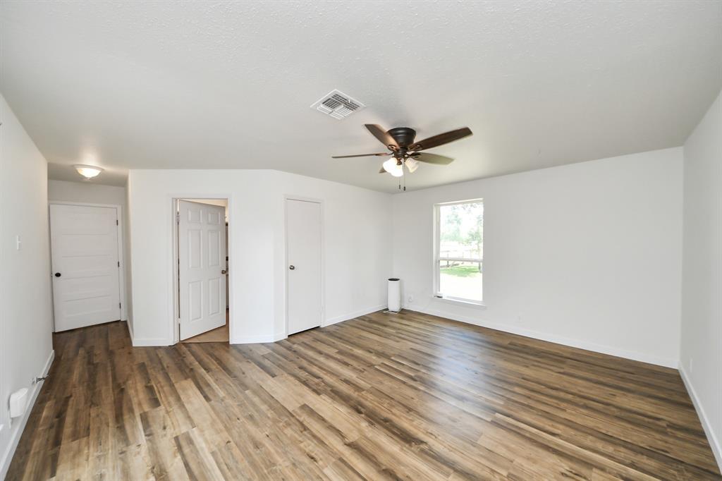 Spacious second primary suite with a large walk-in closet and private bath—ideal for multi-generational living or a luxurious guest retreat.