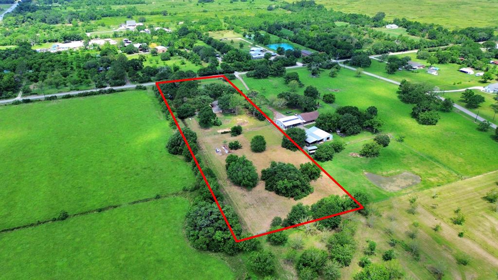 Set on one of the highest points in the neighborhood, this beautifully maintained property blends privacy, beauty, and modern comfort in every square foot.